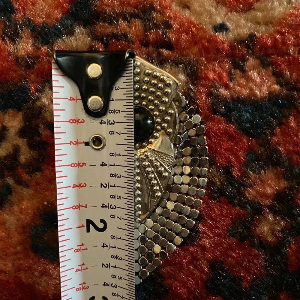 Vintage silver and onyx brooch